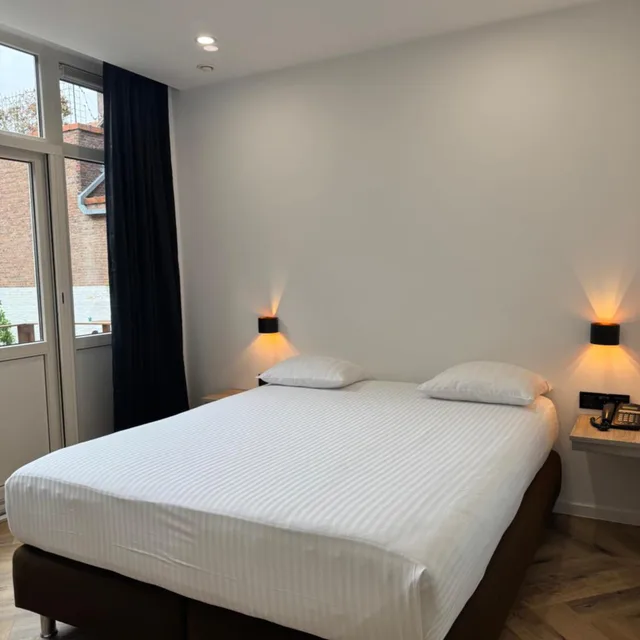 غرفة رباعية، Hotel Port 8/10
