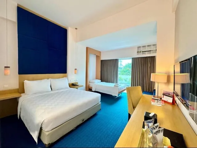 غرفة غراند بريميير ديلوكس بسرير كوين وسرير فردي وسرير كوين، Swiss-Belinn Malang 2/3