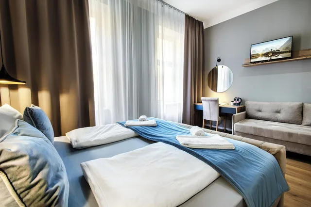 غرفة سوبيريور رباعية بسرير كوين مع أريكة، Hotel Vayalen 2/3