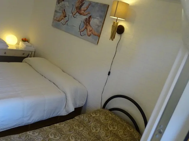 غرفة بسريرين منفصلين بإطلالة على المدينة بحمام مشترك، Casa Papapietro 3/5