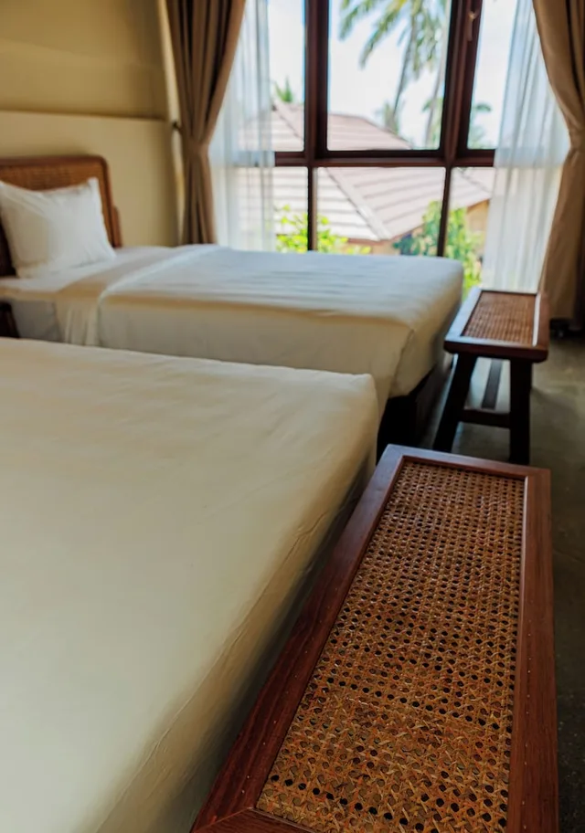 فيلا عائلية بسريرين منفصلين وسرير كينج بغرفتي نوم مع أريكة، Coco Island Retreat Phu Quoc 1/4