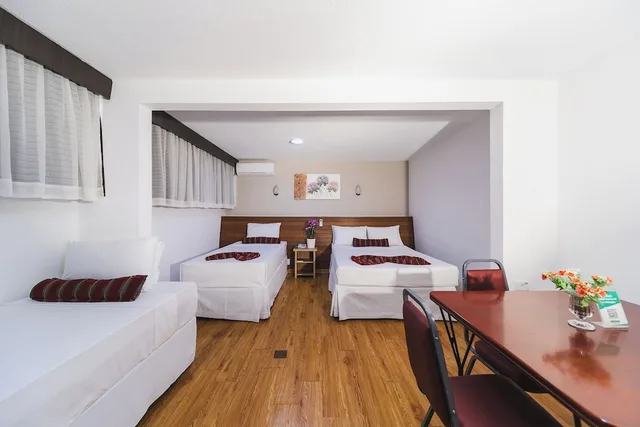 غرفة قياسية رباعية بسرير مزدوج وسريرين منفصلين، Hotel Nacional Inn Curitiba Estacao Shopping 3/7
