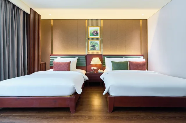 غرفة عائلية بسرير كوين وسرير فردي بإطلالة على المدينة، Kin Hotel Thi Sach Edition 4/9