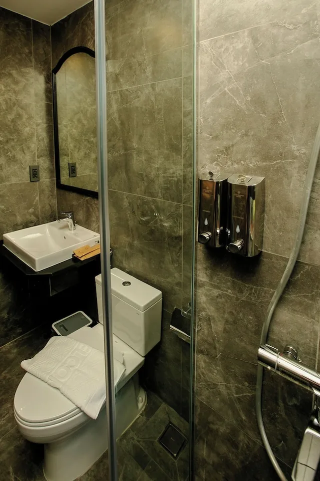 غرفة ديلوكس بسرير كوين، Anvi Saigon Boutique Hotel 9/9
