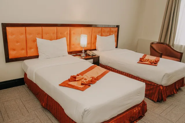 غرفة ديلوكس بسريرين منفصلين، Grand Q Hotel Gorontalo 1/5