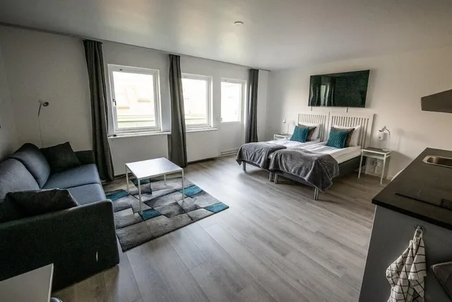 غرفة تنفيذية عائلية بسريرين منفصلين مع أريكة بمطبخ صغير، Hotel Stensson 4/10