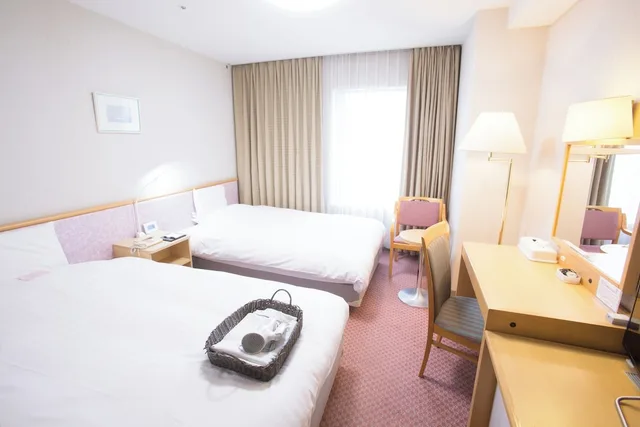 غرفة اقتصادية بسريرين منفصلين، Toyama Chitetsu Hotel 1/3