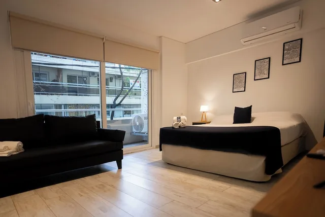 جناح استوديو بسرير كينج مع أريكة، Sucre Suites 3/10