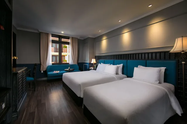 غرفة ديلوكس ثلاثية بسرير كينج وسرير فردي بإطلالة على المدينة، Golden Holiday Hoi An Hotel 4/10