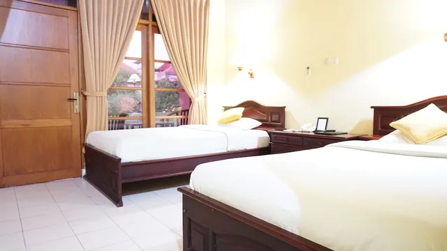 غرفة ديلوكس بسريرين منفصلين، Masainn Hotel Kuta 1/5