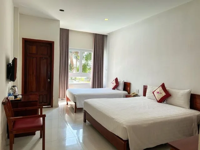 غرفة ديلوكس ثلاثية بسرير مزدوج وسرير فردي، Vanda Hotel 1/3