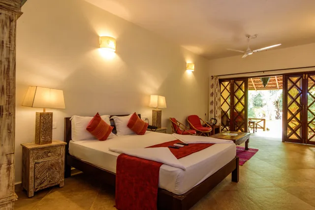 غرفة ديلوكس بسرير كوين بإطلالة على الحديقة، Little India Beach Cottages 1/3