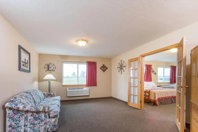2 Rooms, Executive, Suite, King Bed, Balcony, Super 8 by Wyndham Gallipolis Pt Pleasant Area 1/1