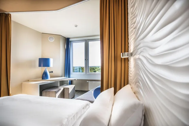 Suite, Lateral Side Sea View, Balcony, a-ja Warnemuende. Das Resort 1/4