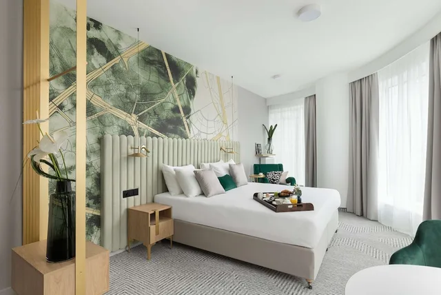 جناح جونيور بسرير كينج بشرفة، Royal Tulip Warsaw Centre 2/7
