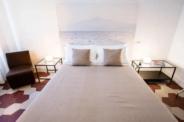 غرفة كومفورت ثلاثية بسرير كوين وسرير فردي بغرفة نوم واحدة بحمام خاص، Rhegion B&B 3/5