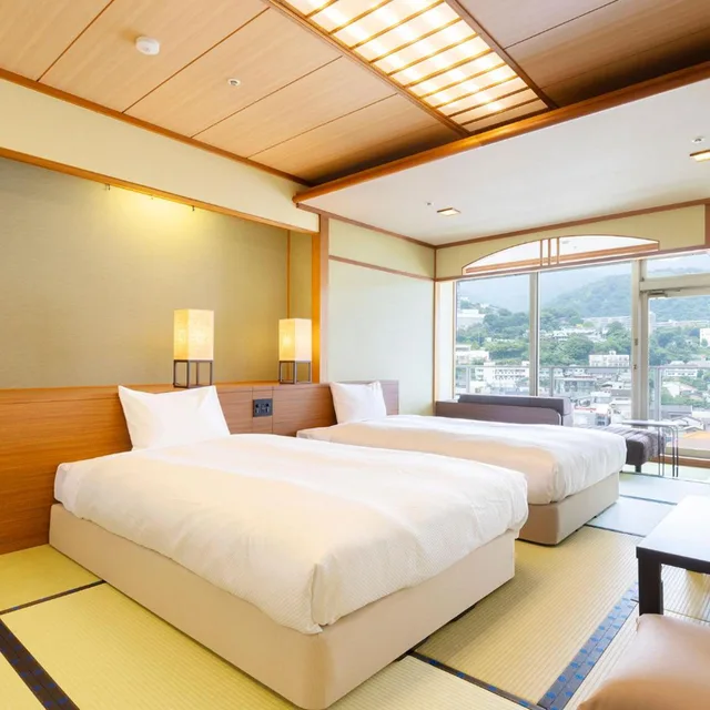 غرفة داخلية يابانية قياسية بسريرين منفصلين بحوض استحمام، Oedo-Onsen-Monogatari Ito Hotel New Okabe 1/5