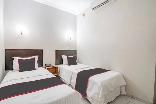غرفة ديلوكس بسريرين منفصلين، Collection O 94063 Olgaria Hotel 1/2