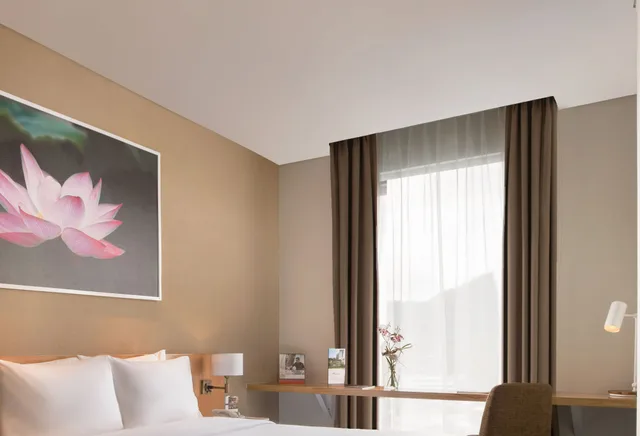 غرفة ديلوكس بسرير كوين، Swiss-Belinn Singkawang 1/3