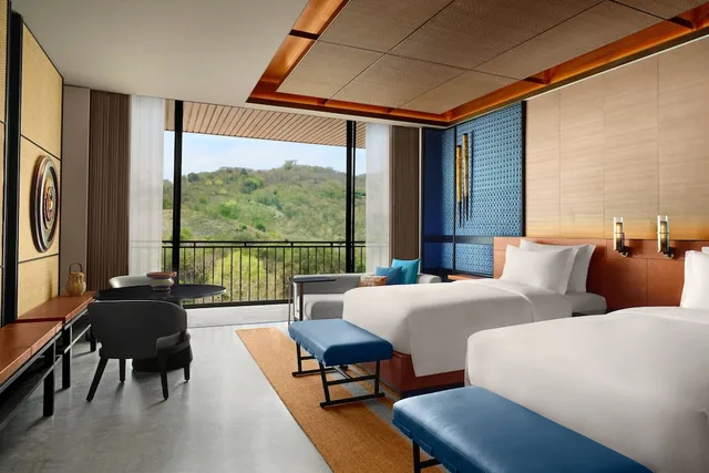 جناح جونيور بسريرين مزدوجين بإطلالة جزئية على البحر، TA’AKTANA a Luxury Collection Resort & Spa, Labuan Bajo 2/5