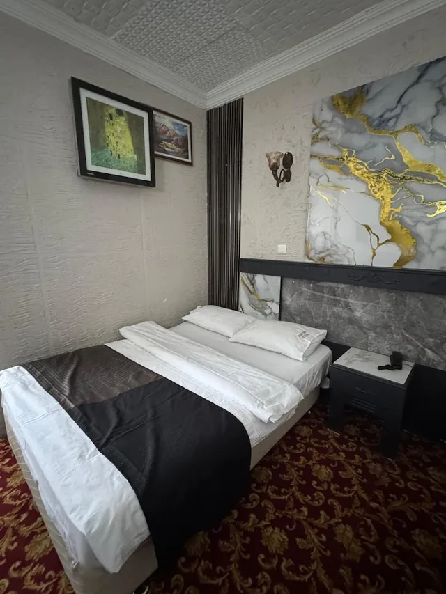 غرفة عائلية بسرير مزدوج وسرير فردي، Otel Antik 2/8