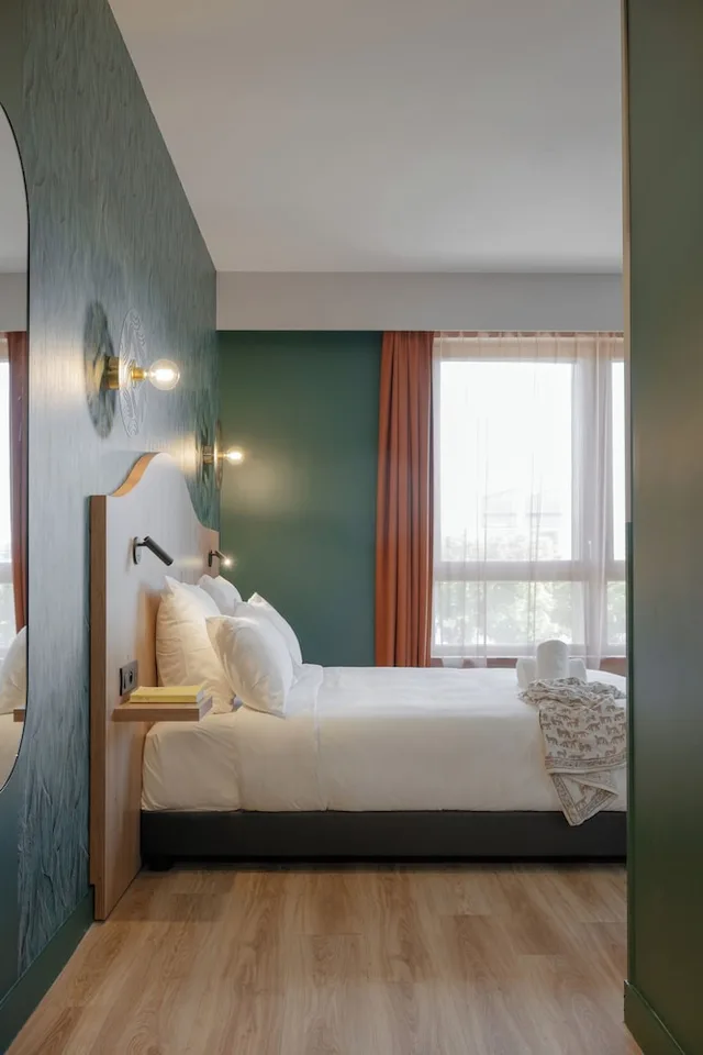 غرفة سوبيريور عائلية مفردة بسرير كوين مع أريكة، All Suites Hotel Paris Pleyel L’Ile Saint Denis 7/10
