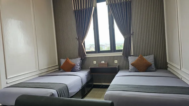 غرفة ديلوكس بسريرين منفصلين للمدخنين، HOTEL MUKTI JAYA 1/3