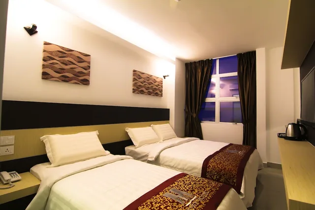 غرفة عائلية ثلاثية بسرير كوين وسرير فردي، Uptown Hotel Seremban 1/4