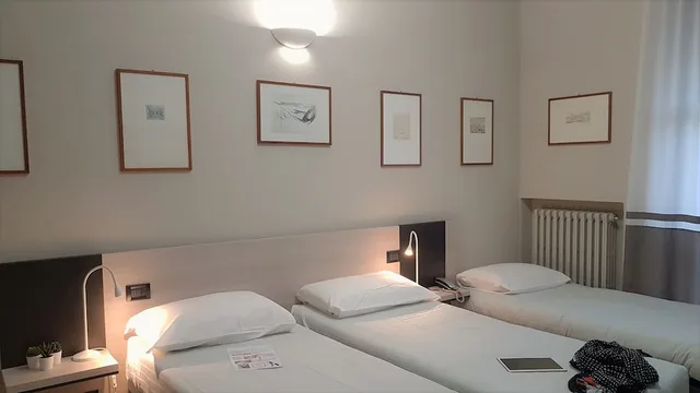 غرفة ثلاثية بسرير كوين مع أريكة، Hotel Gran Torino 3/9
