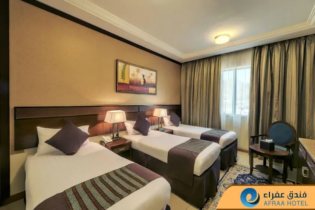 غرفة قياسية رباعية، فندق عفراء(Afraa Hotel) 1/1