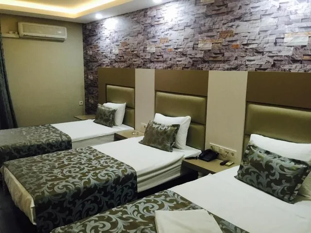 غرفة أساسية ثلاثية بثلاثة أسرّة، Grand Kayalar Hotel 3/7