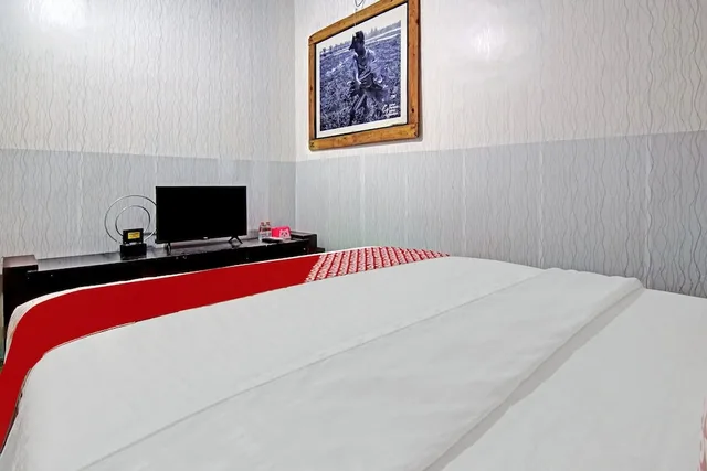 غرفة قياسية بسرير مزدوج، OYO 90358 Poris Residence 4/5