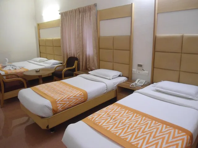 غرفة قياسية رباعية بسريرين كوين، HOTEL RAJADHANE 7/9