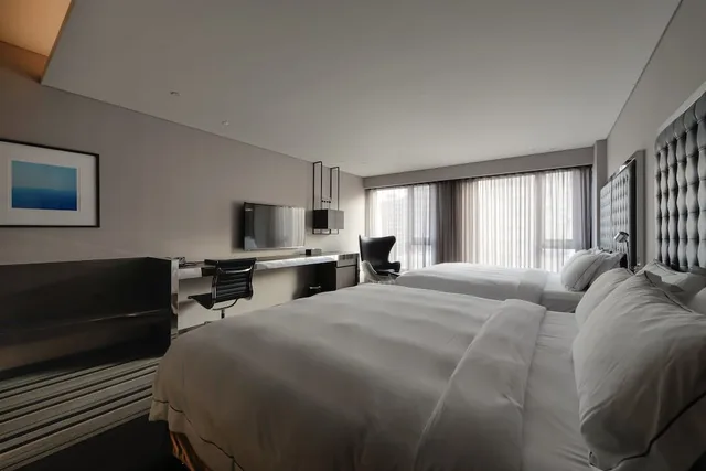 غرفة عائلية رباعية بسريرين مزدوجين، Starhaus Hotel 1/5