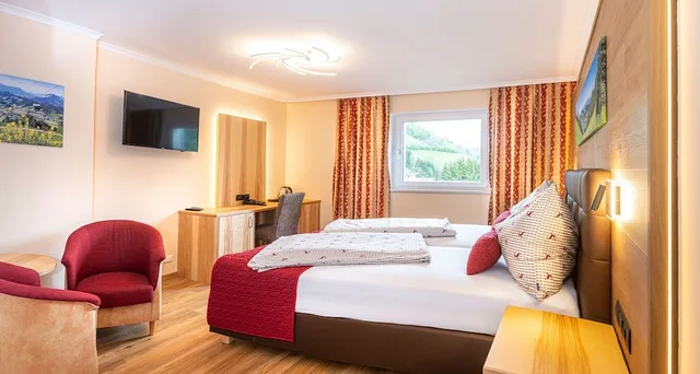 جناح جونيور بسرير كينج مع أريكة، Hotel Schneeberger 1/5