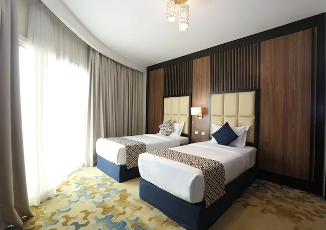 غرفة عائلية رباعية بأربعة أسرّة، فندق السفينة الذهبية(Golden Ship Hotel) 1/3