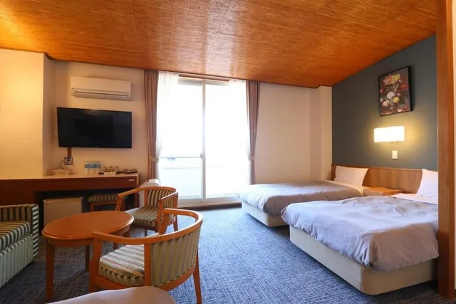 غرفة عائلية رباعية بأربعة أسرّة بإطلالة على البحر، Shinnishiki Hotel 4/6