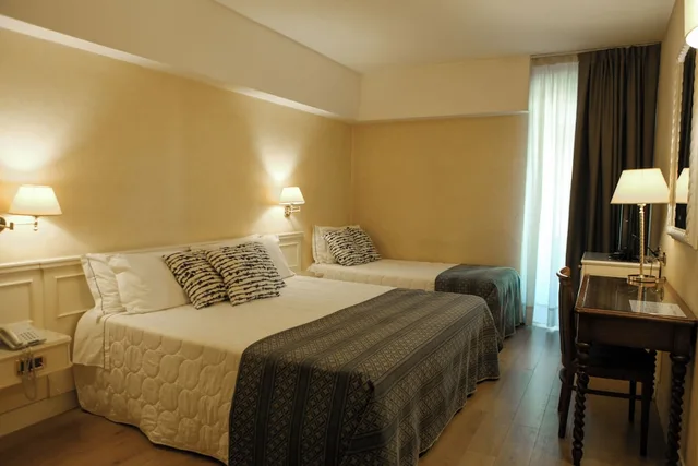 غرفة قياسية ثلاثية بسرير مزدوج وسرير فردي، Hotel I Gigli 1/5