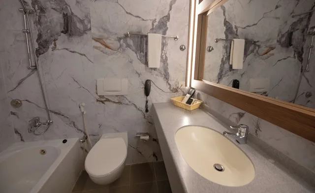 غرفة قياسية مفردة بسرير كوين، Ramee Guestline Hotel 4/4
