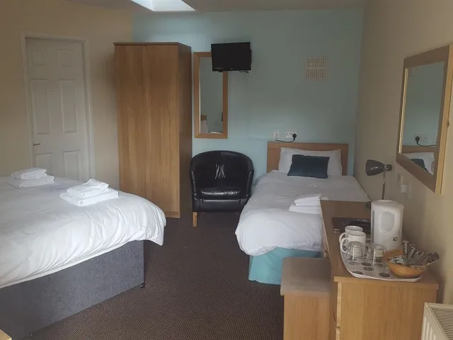 جناح بسرير مزدوج وسرير فردي، The Village Inn 1/2