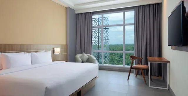 غرفة ديلوكس بسرير كوين، Hotel Santika Gunung Kidul 1/2