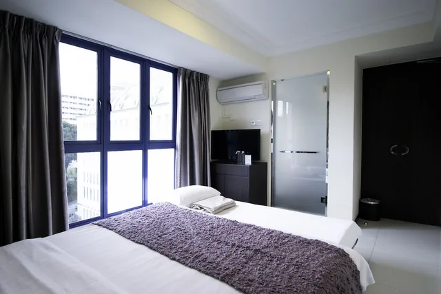 غرفة أساسية ثلاثية بسرير كوين، Harbour Ville Hotel 1/3
