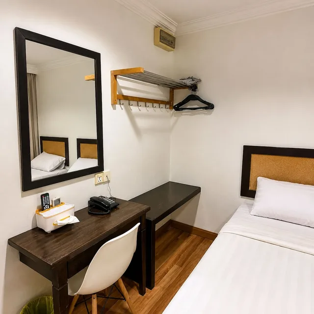 غرفة ديلوكس بسريرين منفصلين، Desa Queenspark Hotel 3/9