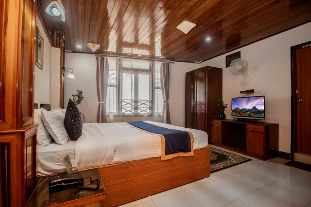 غرفة بريميوم بسرير مزدوج بشرفة، Central Hill Resort Gangtok 1/1