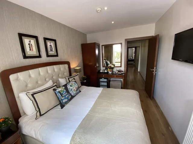 غرفة ديلوكس عائلية ثلاثية بسرير مزدوج بإطلالة على البحر بغرفتي نوم، Four Doors Hotel 2/3