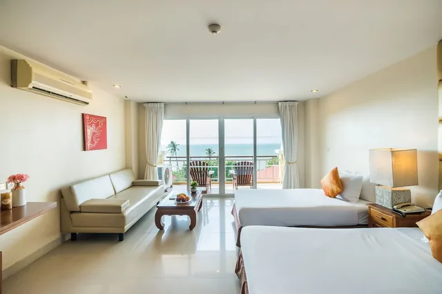 غرفة ديلوكس عائلية بسرير كينج وسرير فردي بإطلالة على البحر، Bella Villa Cabana 1/10