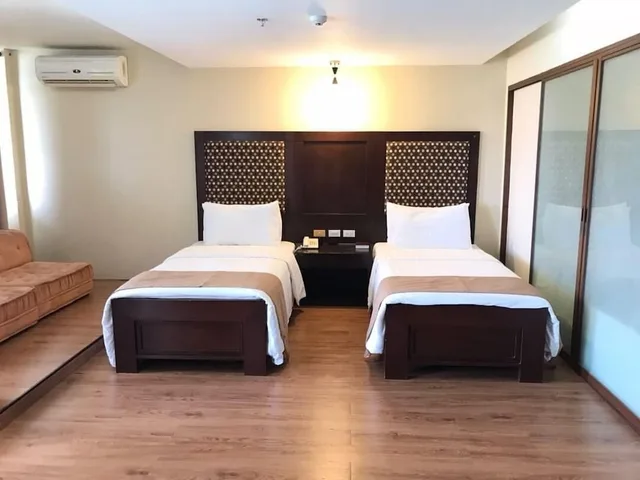 جناح جونيور بسريرين منفصلين، Coron Gateway Hotel Suites 4/8