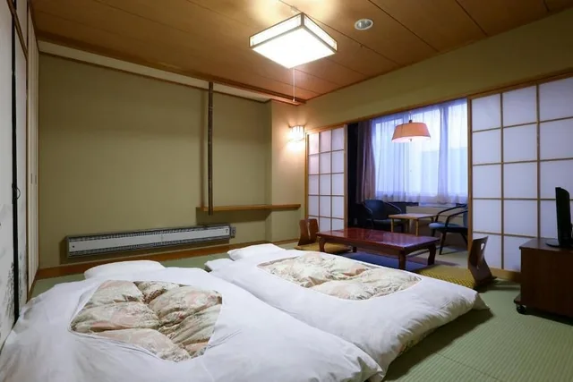 غرفة يابانية بفرشتي فوتون بحمام خاص، Hotel Yudanaka 2/3