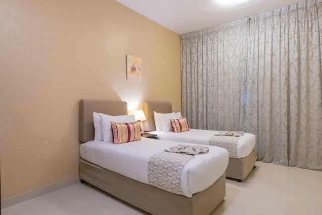 جناح بسرير كينج وسريرين منفصلين بغرفتي نوم، Ewan Tower Hotel Apartments 3/8