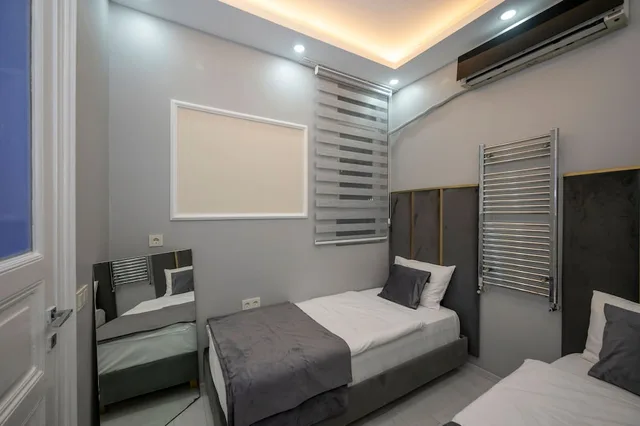 غرفة قياسية رباعية بسرير كوين وسريرين منفصلين بغرفتي نوم في الطابق الأرضي، Hotel Next2 1/5